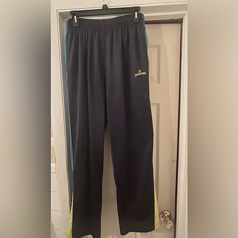 Navy pants with blue and yellow stripe on the side